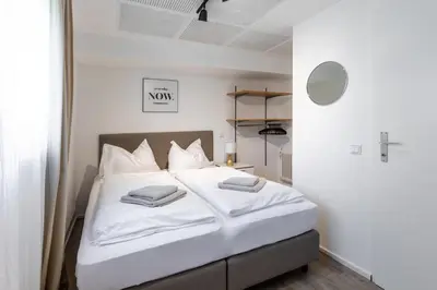 Ein Bett oder Betten in einem Zimmer der Unterkunft Appartements DAS RETTENBACHER