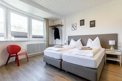 Ein Bett oder Betten in einem Zimmer der Unterkunft Appartements DAS RETTENBACHER
