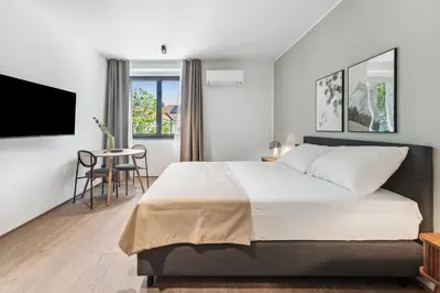 Ein Bett oder Betten in einem Zimmer der Unterkunft Limehome Bad Hall Hauptplatz