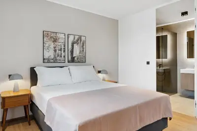 Ein Bett oder Betten in einem Zimmer der Unterkunft Limehome Bad Hall Hauptplatz