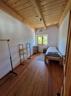 Ein Bett oder Betten in einem Zimmer der Unterkunft Wohnung mit Garten