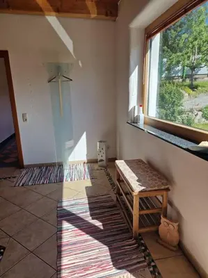 Ein Sitzbereich in der Unterkunft Wohnung mit Garten
