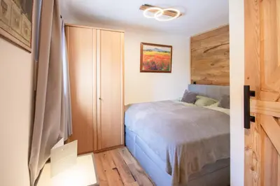 Ein Bett oder Betten in einem Zimmer der Unterkunft Appartementhaus Hoamart Appartements