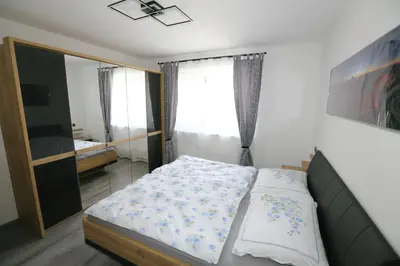 Ein Bett oder Betten in einem Zimmer der Unterkunft Ferienwohnung Sölkner