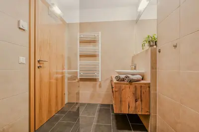 Ein Badezimmer in der Unterkunft Ski-In&Out auf 1641m, Sauna, Tiefgarage