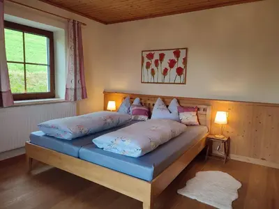 Ein Bett oder Betten in einem Zimmer der Unterkunft Sonnseit`n Hochmaisalm