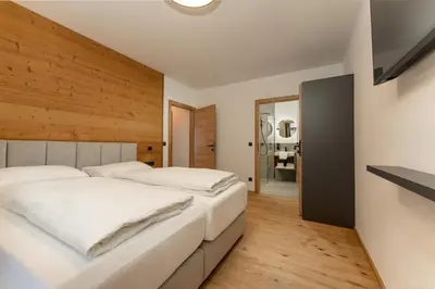Ein Bett oder Betten in einem Zimmer der Unterkunft Pure Alpine Suites