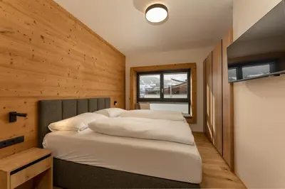 Ein Bett oder Betten in einem Zimmer der Unterkunft Pure Alpine Suites