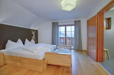 Ein Bett oder Betten in einem Zimmer der Unterkunft Panorama Chalet Grau