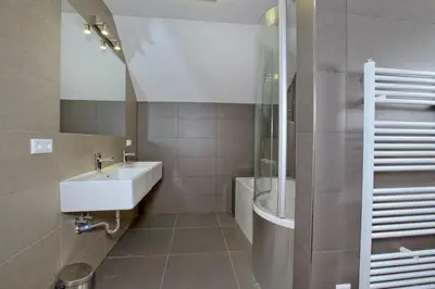 Ein Badezimmer in der Unterkunft Panorama Chalet Grau