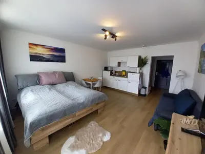 Ein Bett oder Betten in einem Zimmer der Unterkunft Apartment Auszeit Strobl