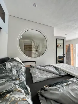 Ein Bett oder Betten in einem Zimmer der Unterkunft Premium-Wohlfühlappartement Schladming-Dachstein