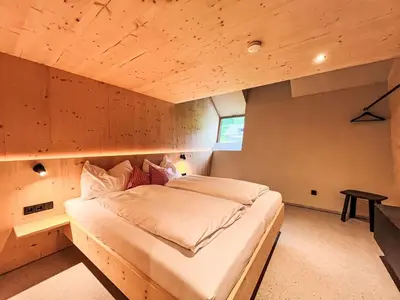 Ein Bett oder Betten in einem Zimmer der Unterkunft Apartment Hideaway Planneralm by Jufa Hotels-3 by Interhome