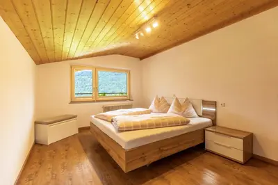 Ein Bett oder Betten in einem Zimmer der Unterkunft Haus Sonnblick