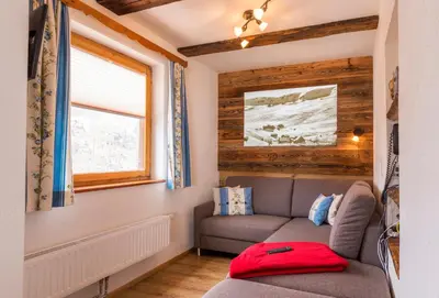 Ein Sitzbereich in der Unterkunft AUSZEIT Almchalet