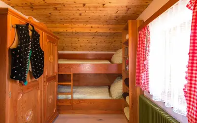 Ein Bett oder Betten in einem Zimmer der Unterkunft AUSZEIT Almchalet
