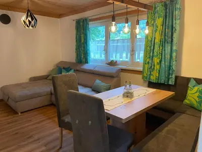 Ein Sitzbereich in der Unterkunft Ferienhaus Romantika