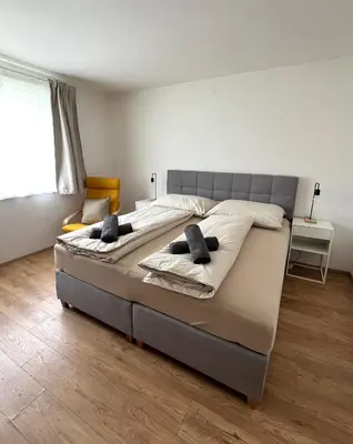 Ein Bett oder Betten in einem Zimmer der Unterkunft Dark Sky ONE