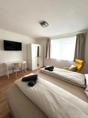 Ein Bett oder Betten in einem Zimmer der Unterkunft Dark Sky ONE