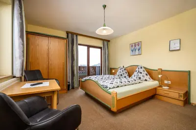 Ein Bett oder Betten in einem Zimmer der Unterkunft Hornergut