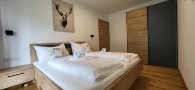 Ein Bett oder Betten in einem Zimmer der Unterkunft SFischbacher App 1 by Alpenidyll Apartments