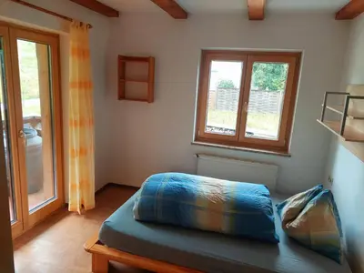 Ein Bett oder Betten in einem Zimmer der Unterkunft Ferienappartment Hölzl