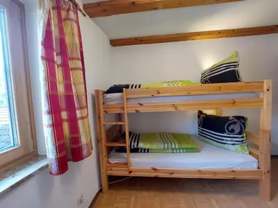 Ein Bett oder Betten in einem Zimmer der Unterkunft Ferienappartment Hölzl