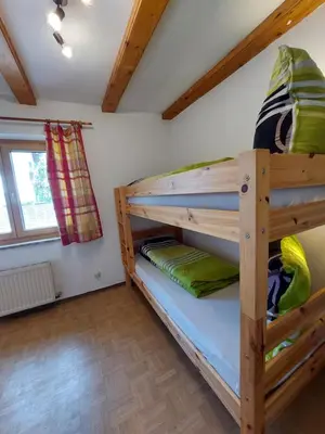 Ein Bett oder Betten in einem Zimmer der Unterkunft Ferienappartment Hölzl