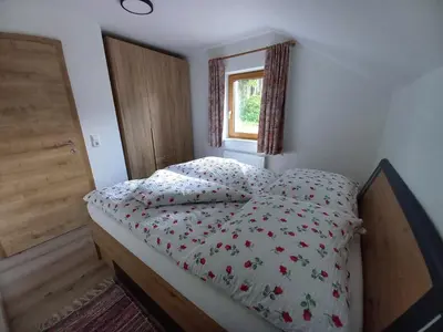 Ein Bett oder Betten in einem Zimmer der Unterkunft Ferienwohnung Feichter