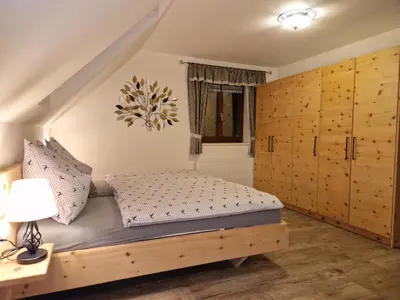 Ein Bett oder Betten in einem Zimmer der Unterkunft Ferienwohnung 