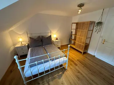Ein Bett oder Betten in einem Zimmer der Unterkunft Nannerls Penthouse