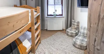 Ein Bett oder Betten in einem Zimmer der Unterkunft Apartment Ferienhaus Seidlgut