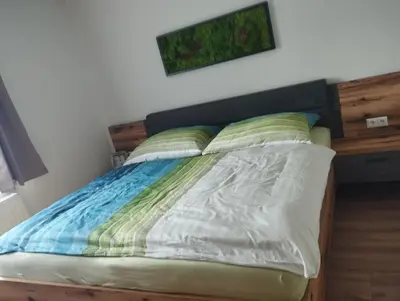 Ein Bett oder Betten in einem Zimmer der Unterkunft Kathis Burgblick