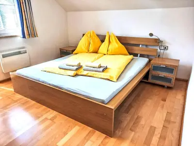 Ein Bett oder Betten in einem Zimmer der Unterkunft Chalet Astrid by Interhome