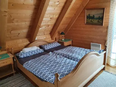 Ein Bett oder Betten in einem Zimmer der Unterkunft Ferienhaus Müller-Kräuter