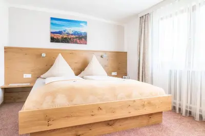 Ein Bett oder Betten in einem Zimmer der Unterkunft Gschwandtgut Urlaub am Bauernhof