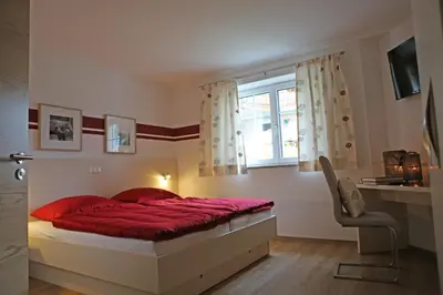 Ein Bett oder Betten in einem Zimmer der Unterkunft Zeilner Dachstein Apartment