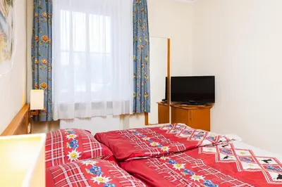 Ein Bett oder Betten in einem Zimmer der Unterkunft Ferien beim Steiner