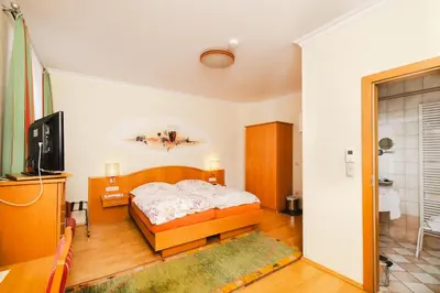 Ein Bett oder Betten in einem Zimmer der Unterkunft Ferien beim Steiner