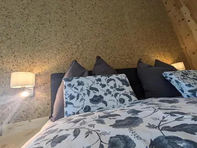 Ein Bett oder Betten in einem Zimmer der Unterkunft Penthouse Bergblick Salzkammergut