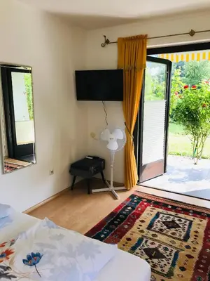 Ein Bett oder Betten in einem Zimmer der Unterkunft Ferienwohnung am Golfplatz