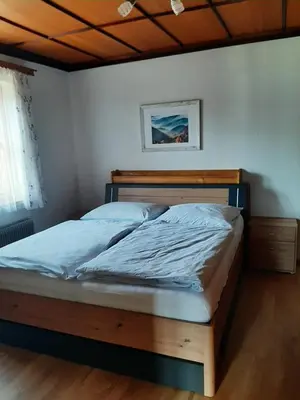 Ein Bett oder Betten in einem Zimmer der Unterkunft Apartment - Am Buchenhof