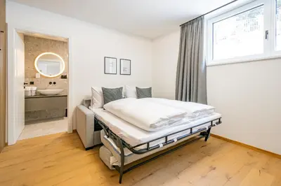 Ein Bett oder Betten in einem Zimmer der Unterkunft Kirchner's Apartments