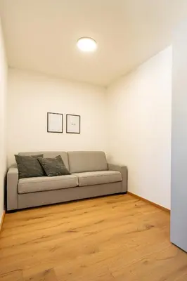 Ein Sitzbereich in der Unterkunft Kirchner's Apartments