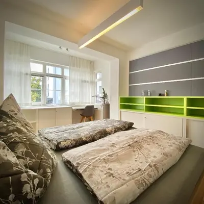 Ein Bett oder Betten in einem Zimmer der Unterkunft ROSA Wohnen & home office in traditionell Ausseer Baukultur