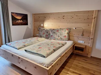 Ein Bett oder Betten in einem Zimmer der Unterkunft Ferienwohnung Appesbacher