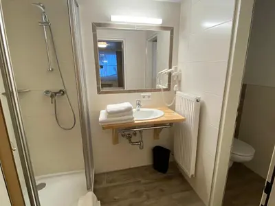 Ein Badezimmer in der Unterkunft Reithabhof Apartments