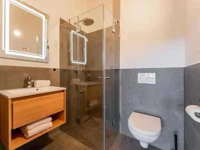 Ein Badezimmer in der Unterkunft Grebenzen Lodge 53