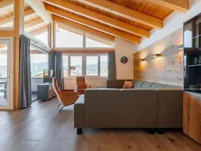 Ein Sitzbereich in der Unterkunft Grebenzen Lodge 53
