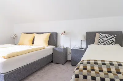 Ein Bett oder Betten in einem Zimmer der Unterkunft Appartements K62